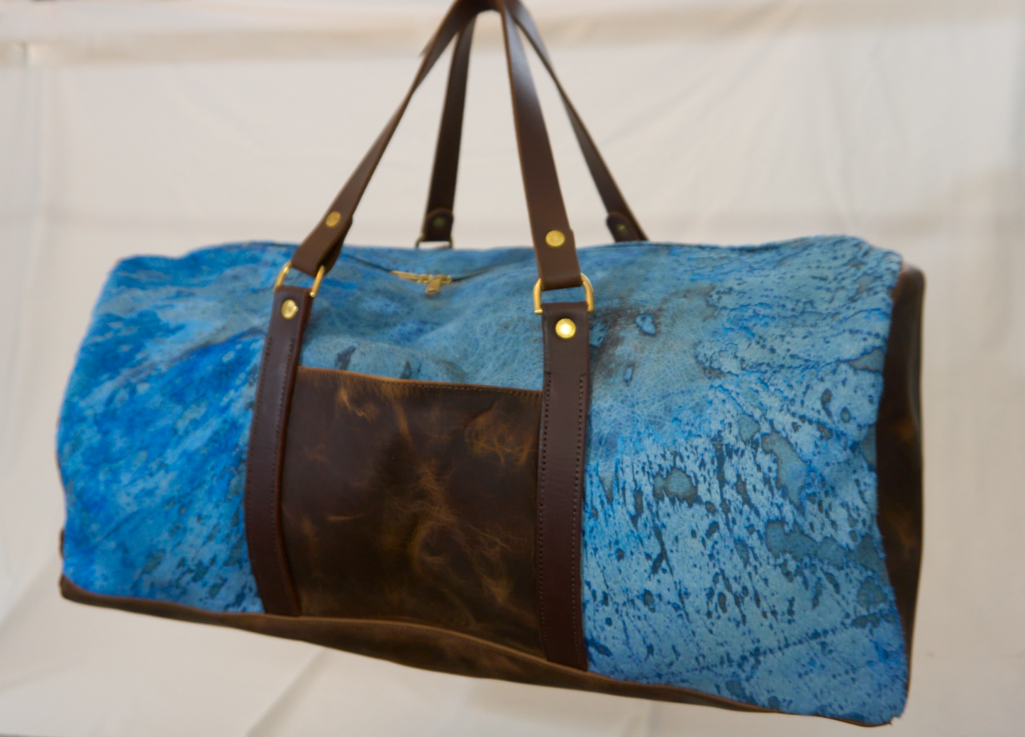 Electric blue hair-on leather duffel