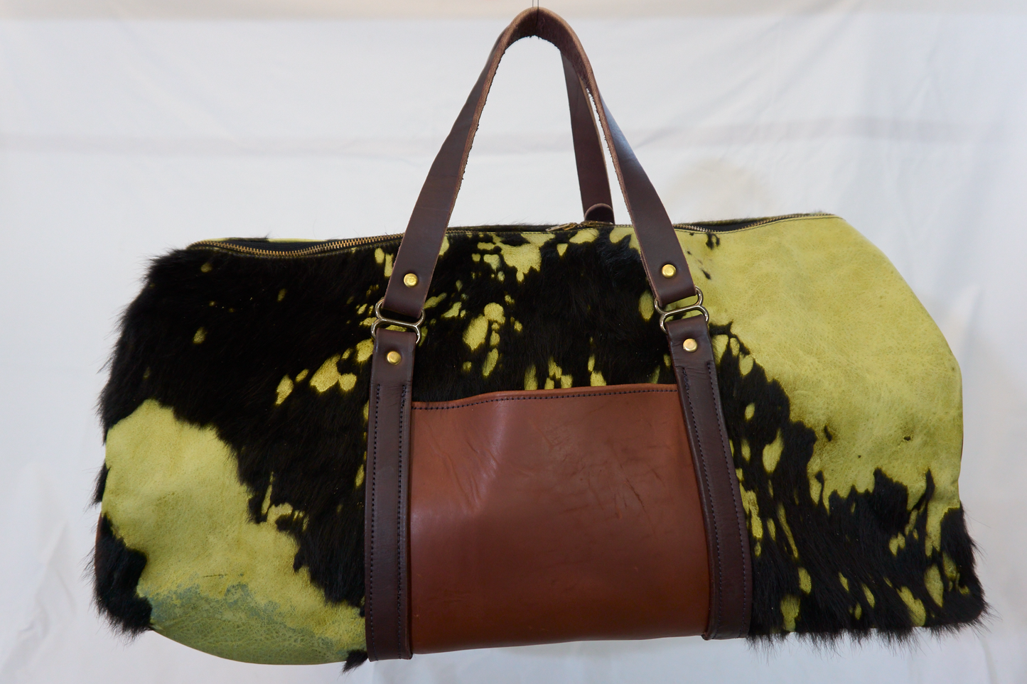 Electric green duffel made from premium hair-on acid-washed cowhide