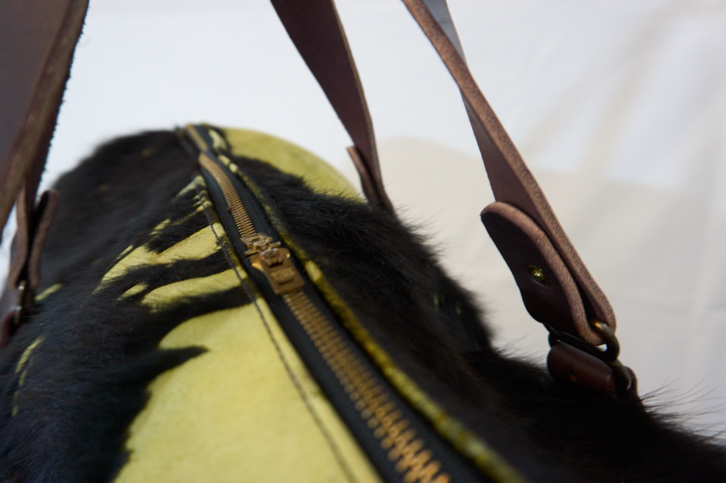 Electric green duffel made from premium hair-on acid-washed cowhide