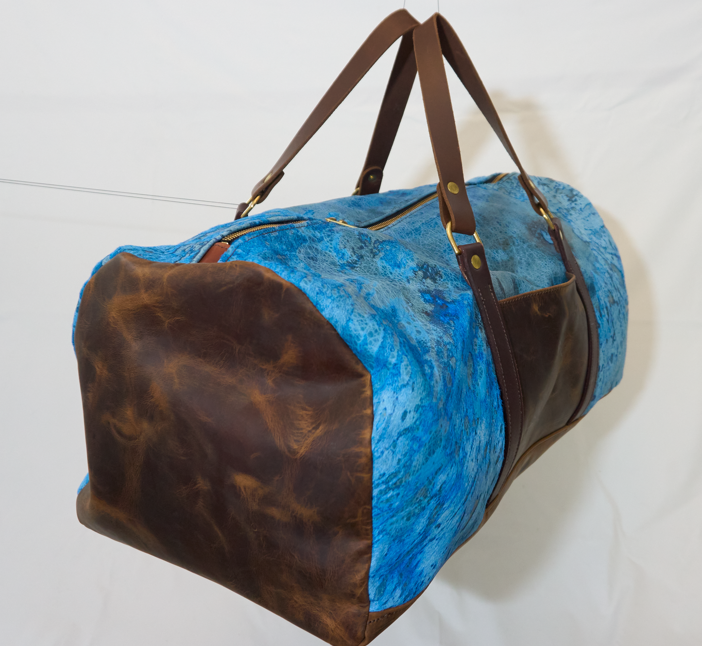 Electric blue hair-on leather duffel