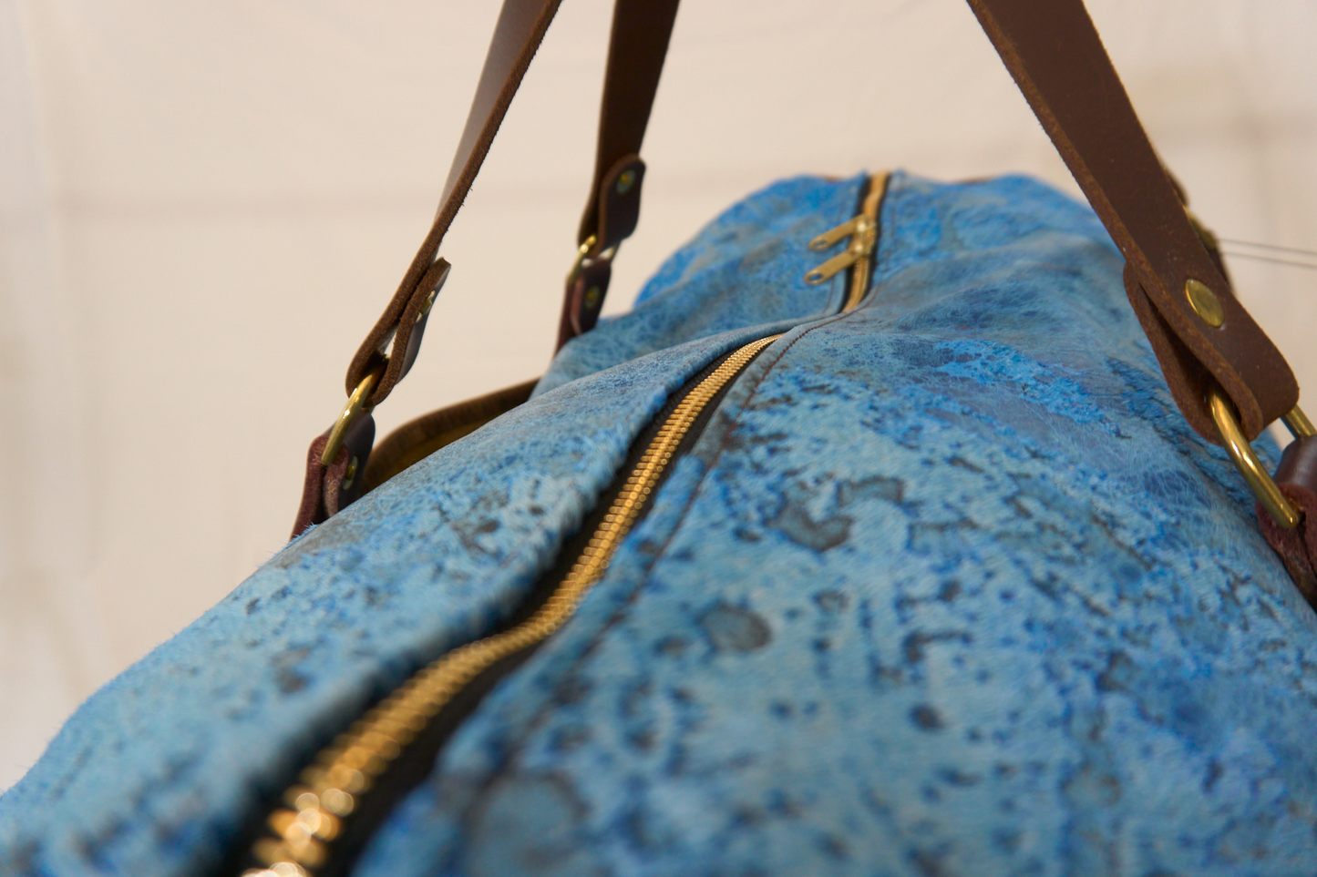 Electric blue hair-on leather duffel