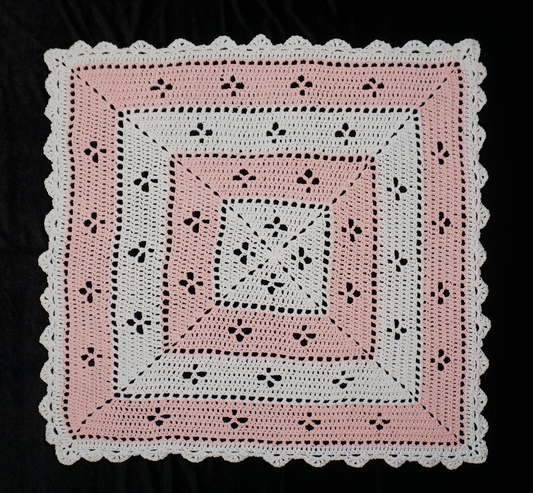 Soft, cuddly hand-crocheted cotton blanket with pink and white squares