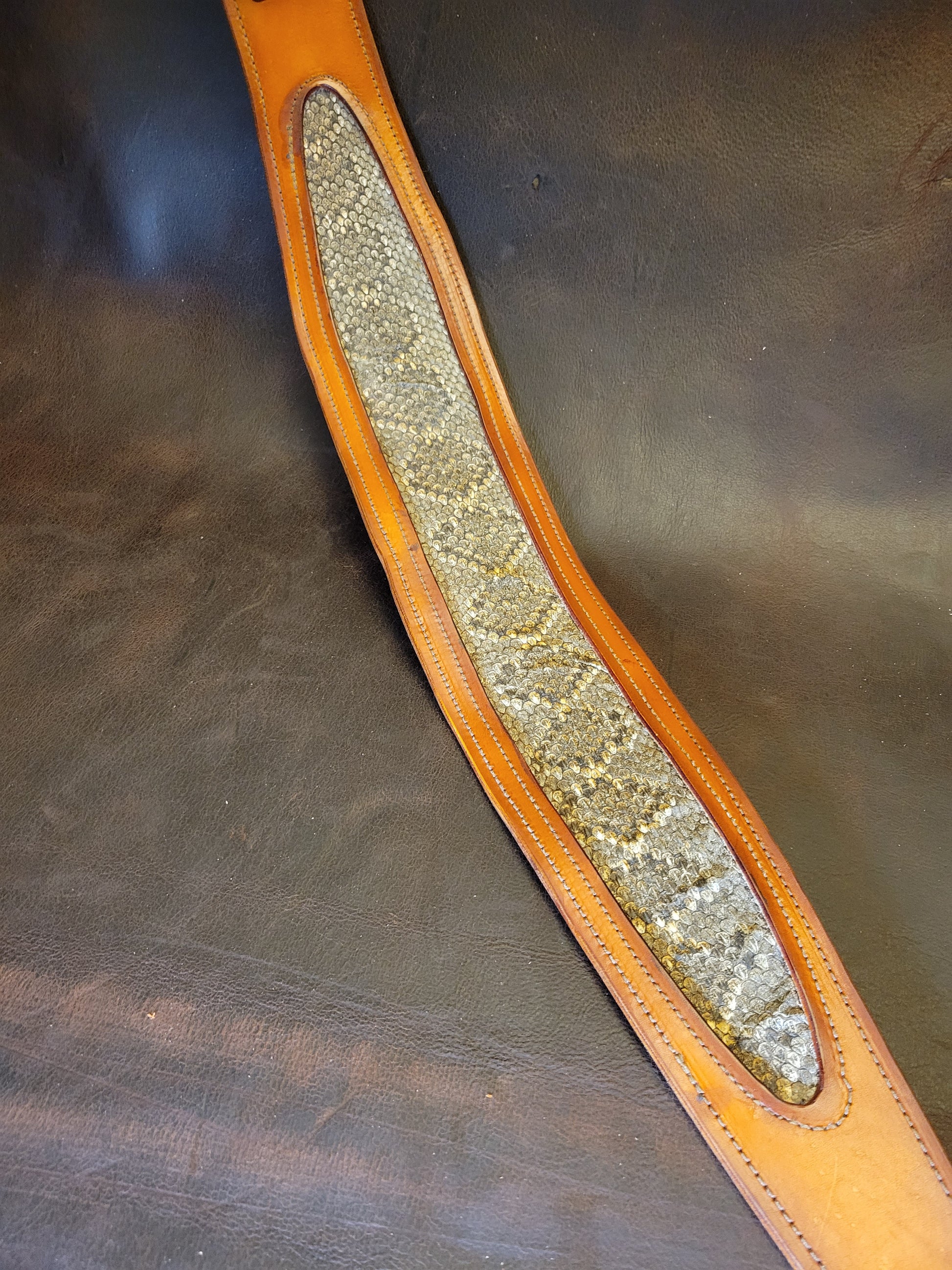 Topgrain leather guitar strap with Georgia rattlesnake inlay